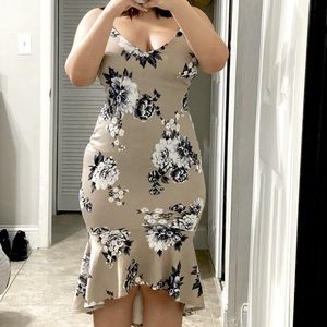 Unique dress , spaghetti strap , low back and figure hugging dress.